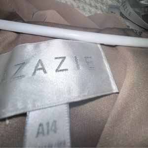 Full length formal dress with shawl that can be worn several ways.